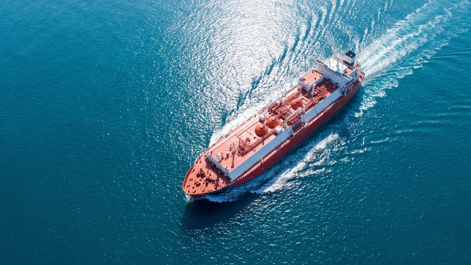 A gas carrier at sea, seen from above